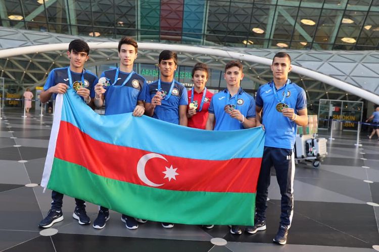 Riqada uğura imza atan cüdoçularımız Bakıya döndü - FOTOSESSİYA