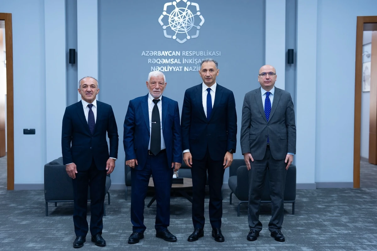 Rəşad Nəbiyev veteran cüdoçu Əhməddin Rəcəbli ilə görüşüb - FOTO
