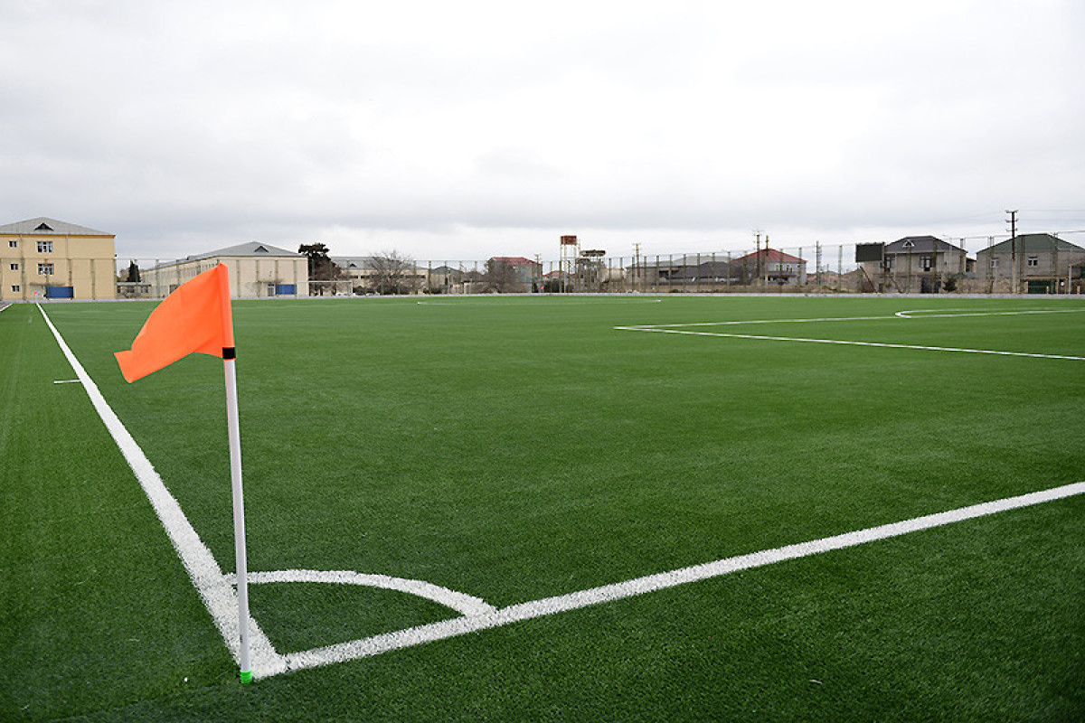 Binə stadionunun ot örtüyü yenilənib - FOTO 